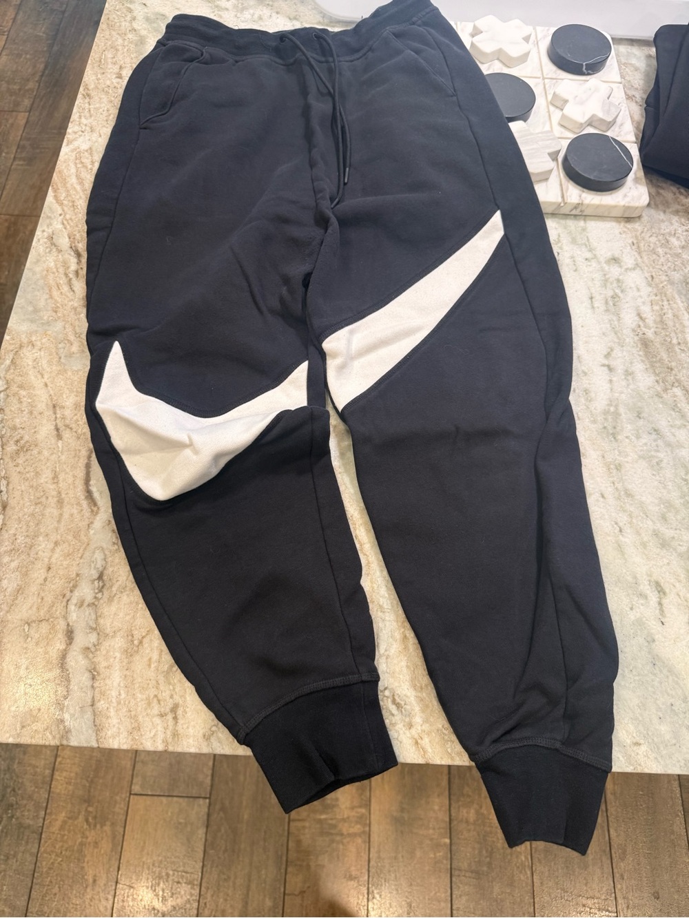 Nike Black Joggers with White Swoosh Detail